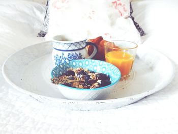 High angle view of fresh breakfast served in plate on table