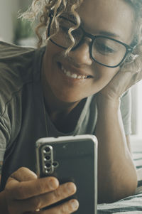 Portrait of man using mobile phone