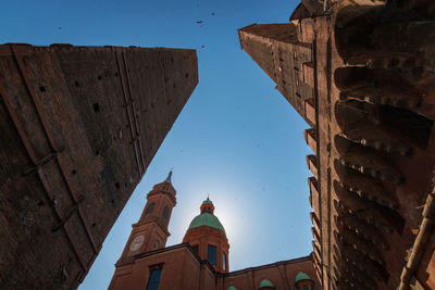 Low angle view of two towers asinelli and garisenda in bologna, italy