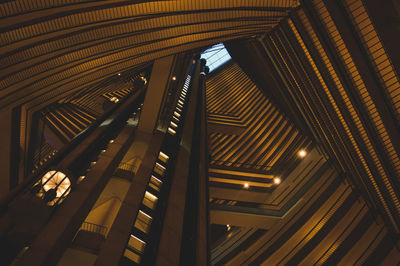 Low angle view of illuminated building interior