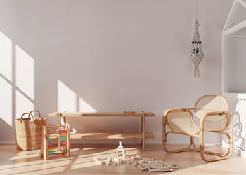 Empty white wall in modern child room. mock up interior in scandinavian, boho style. copy space 