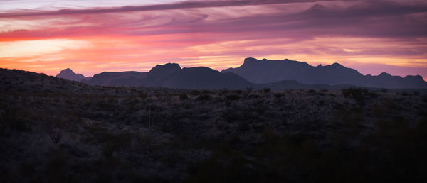 Scenic view of silhouette mountains against sky during sunset in big bend national park - texas