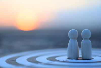 Close-up of water against sky during sunset
