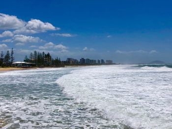 Scenic view of sea against blue sky