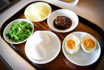 High angle view of breakfast served on table