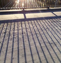 High angle view of metal fence in city