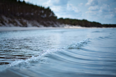 Surface level of sea against sky