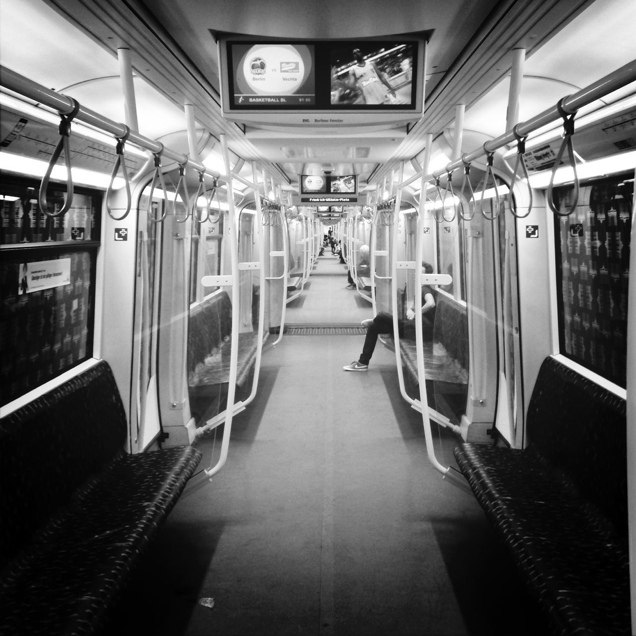 indoors, ceiling, the way forward, empty, corridor, architecture, built structure, diminishing perspective, absence, lighting equipment, illuminated, flooring, interior, transportation, subway, tiled floor, narrow, incidental people, public transportation, vanishing point