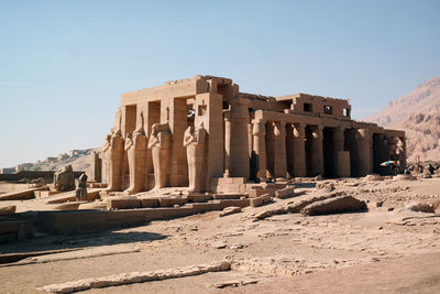 Old ruins of temple against clear sky