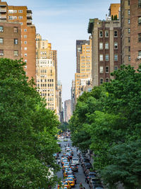 Skyscrapers in city against sky