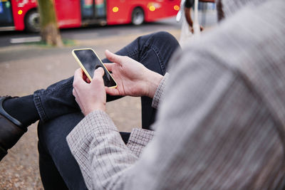 Young man using mobile phone