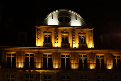 Illuminated building at night