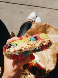 Midsection of woman holding ice cream