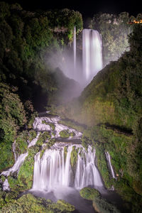 View of waterfall in forest