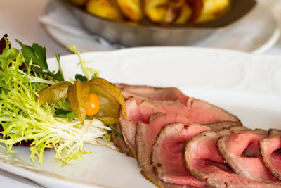 Close-up of meal served in plate on table