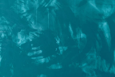 Full frame shot of tree trunk in sea