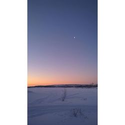 Scenic view of snow covered landscape