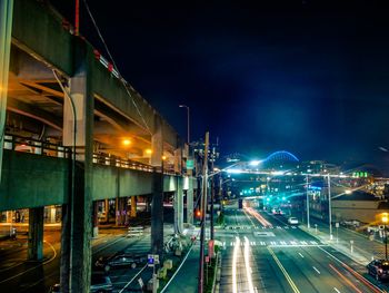 Light trails on road in city at night