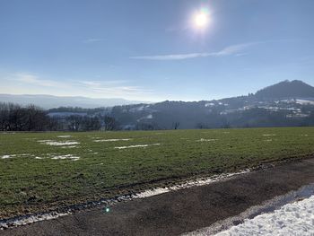 Scenic view of field against sky