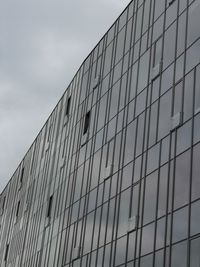 Low angle view of modern building against sky