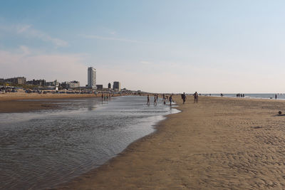 Scenic view of beach against sky at zandvoort