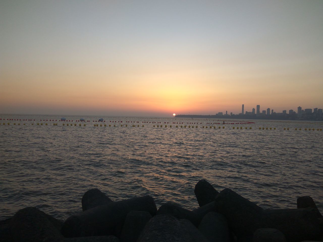 VIEW OF SEA AT SUNSET