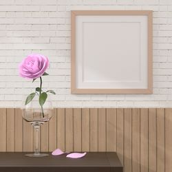 Pink roses in vase on table against wall