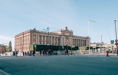 Group of people in front of building