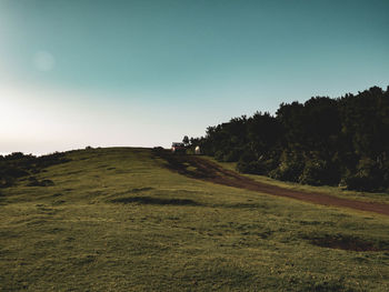 Scenic view of land against clear sky