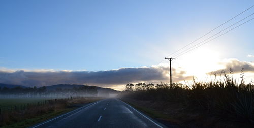 Road passing through field