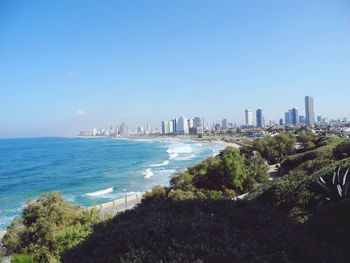 View of cityscape with sea in background