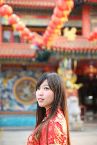 Portrait of smiling young woman