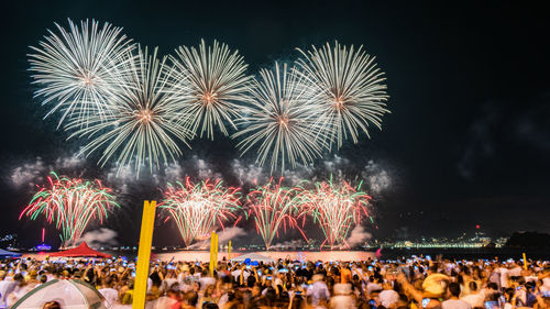 Firework display at night