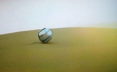 High angle view of ball on table against wall