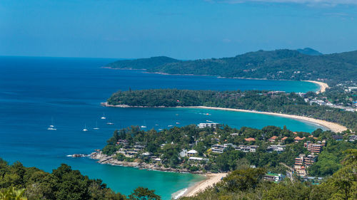 High angle view of sea and bay against sky