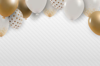 High angle view of white balloons on table