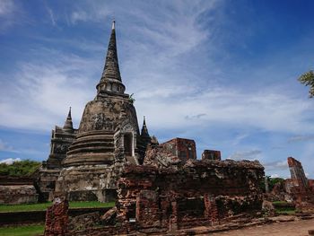 Old temple building against sky