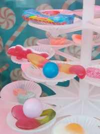 High angle view of multi colored candies on table