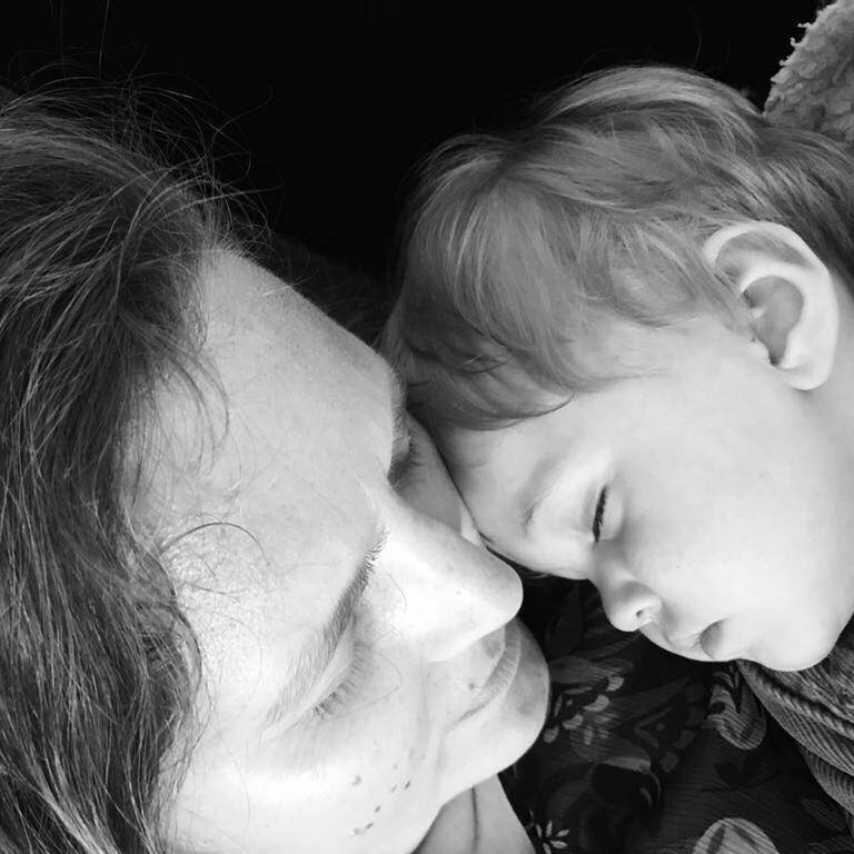 CLOSE-UP OF CUTE BABY GIRL WITH MOTHER