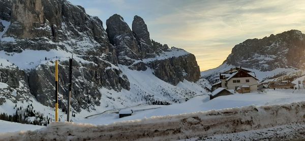 Scenic view of snowcapped mountains against sky during winter