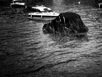 Boat moored in lake