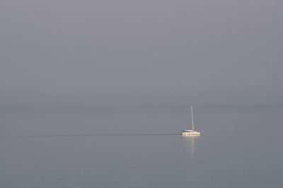 Boat sailing in sea