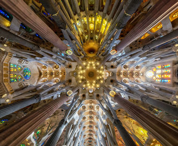 Low angle view of illuminated ceiling of building