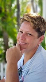 Portrait of smiling young man outdoors