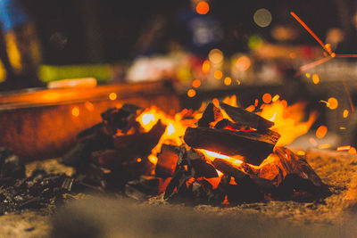 Close-up of fire burning at night