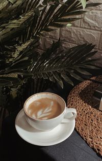 High angle view of coffee cup on table