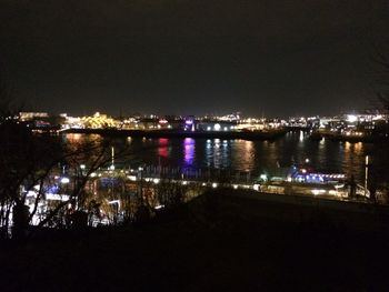 Illuminated cityscape at night