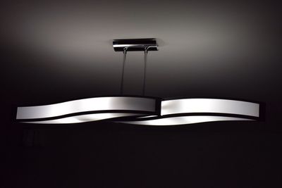 Low angle view of illuminated lamp