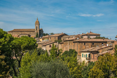 Low angle view of buildings against sky in montalcino tuscany italy