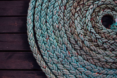 High angle view of rope on pier